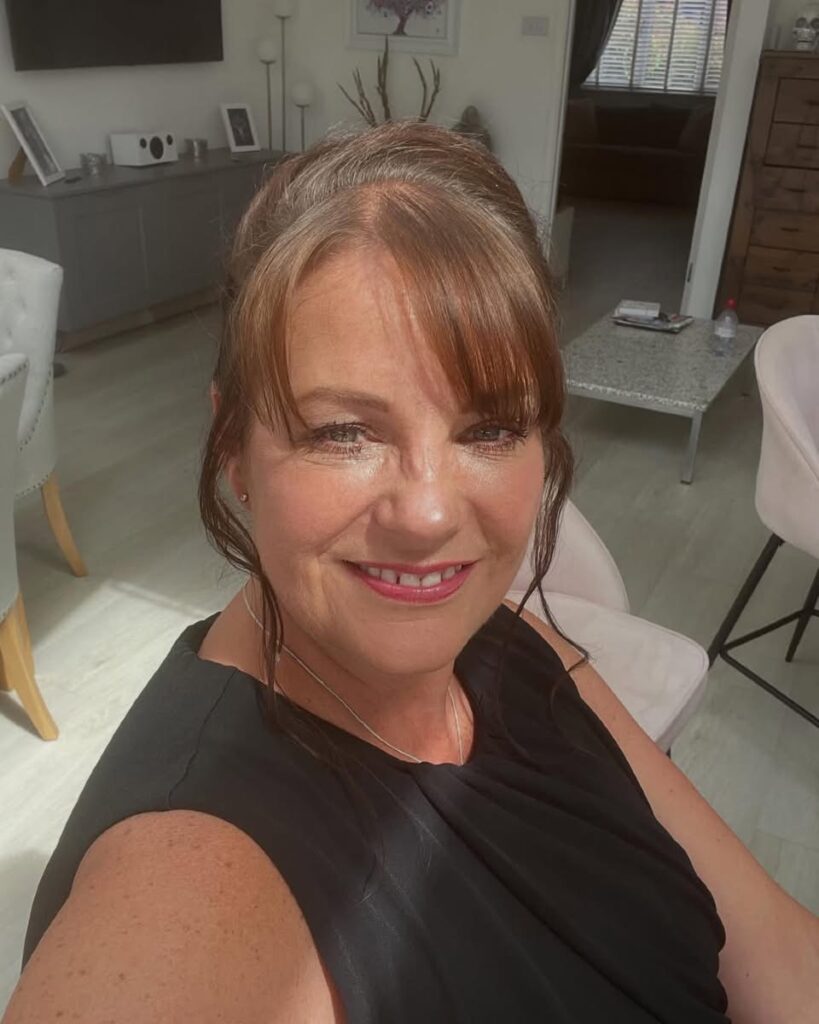 A picot of Liz, Liz works this around her corporate role because of the love of travel and how she can travel smarter and book holidays for her friends and family 